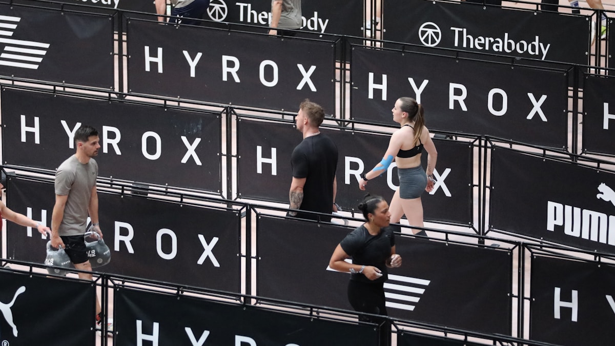Athletes competing at HYROX indoor event